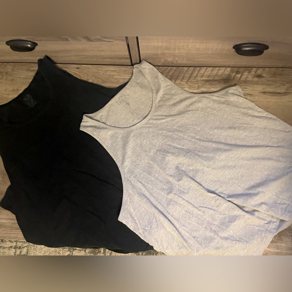 Black and gray men’s tanks